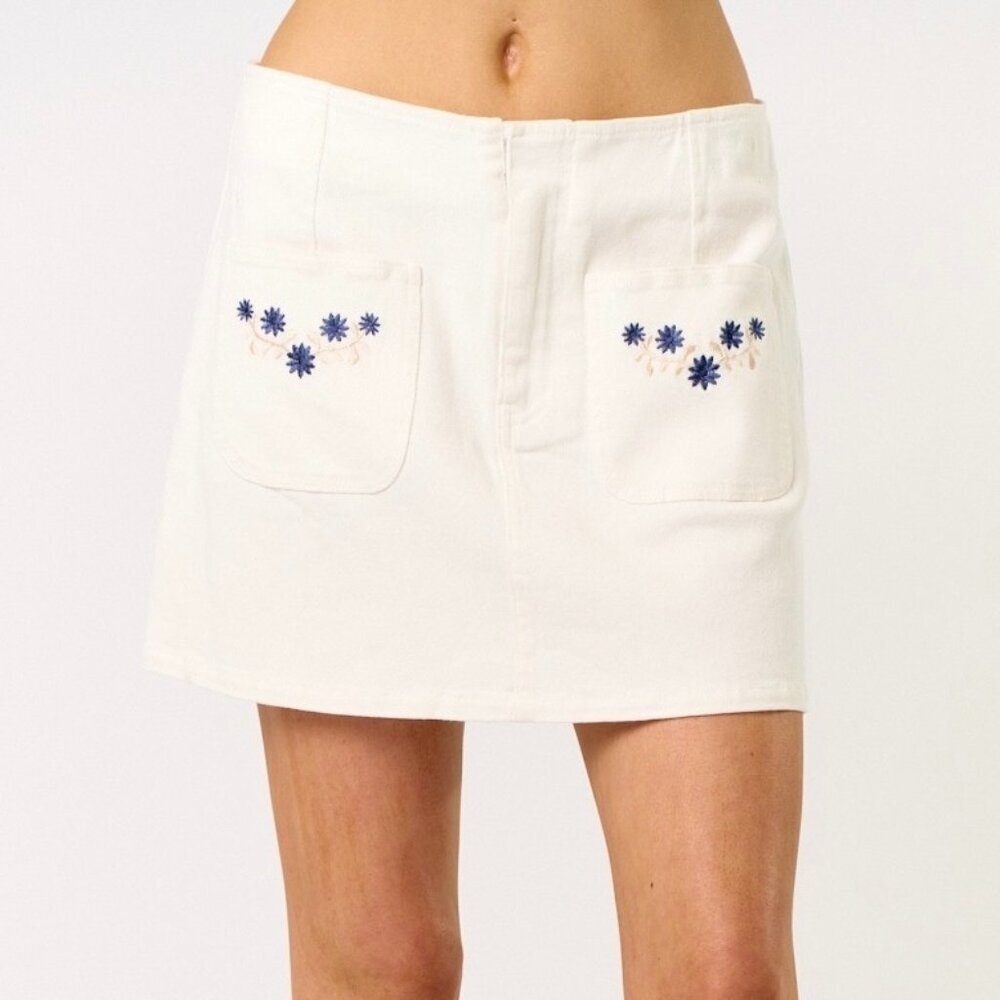 FROM THE FRONT EMBROIDERED MINI SKIRT